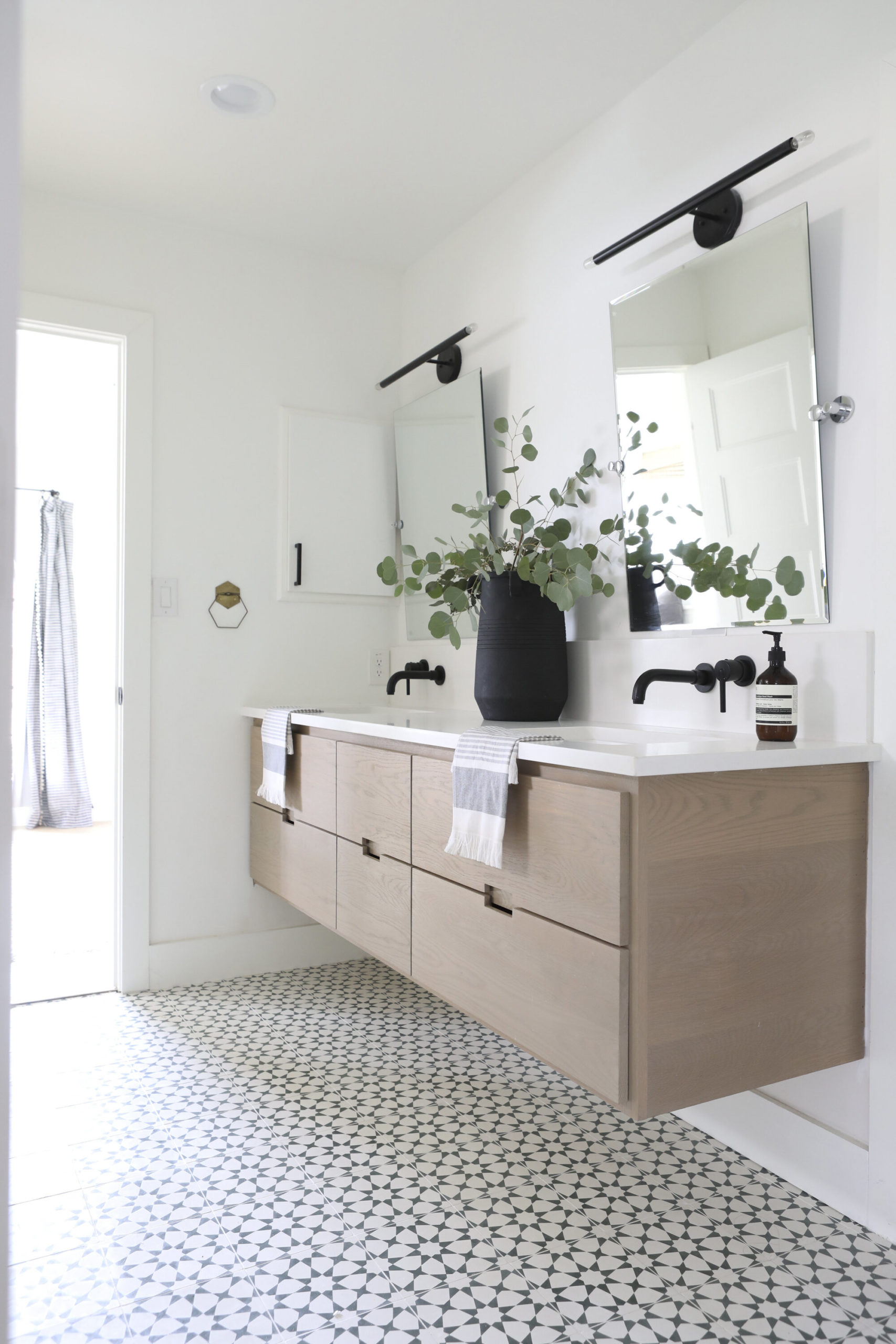 Wall Sconces // Faucets // Mirrors// Hand Towel // Towel Ring // Vase // Tile // Vanity (custom by Axiom Builders)